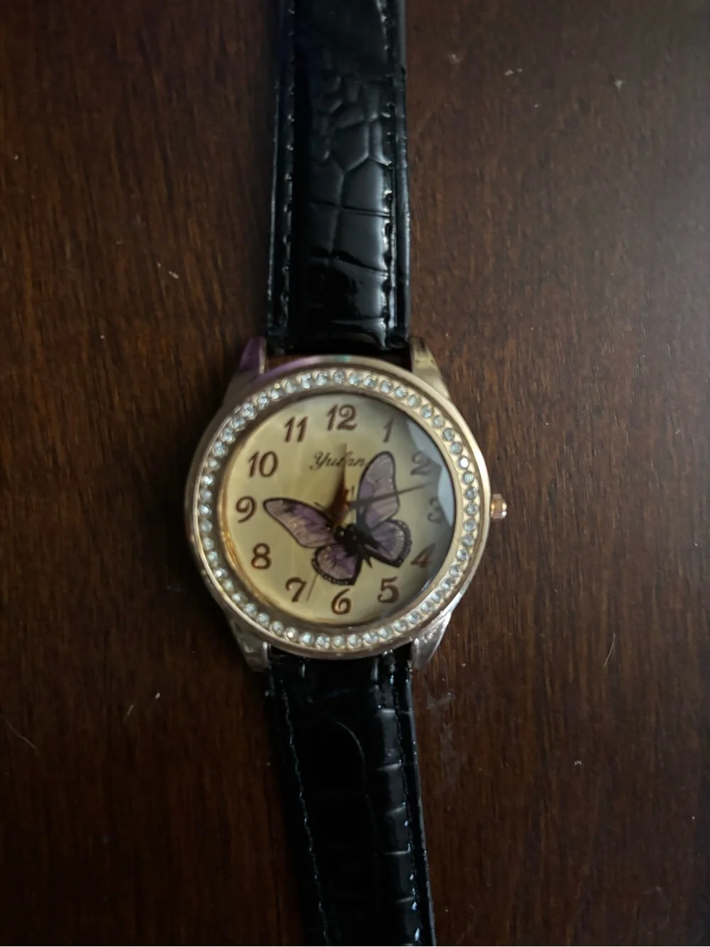 Women's Black Strap Butterfly Dial Watch with Crystal Bezel